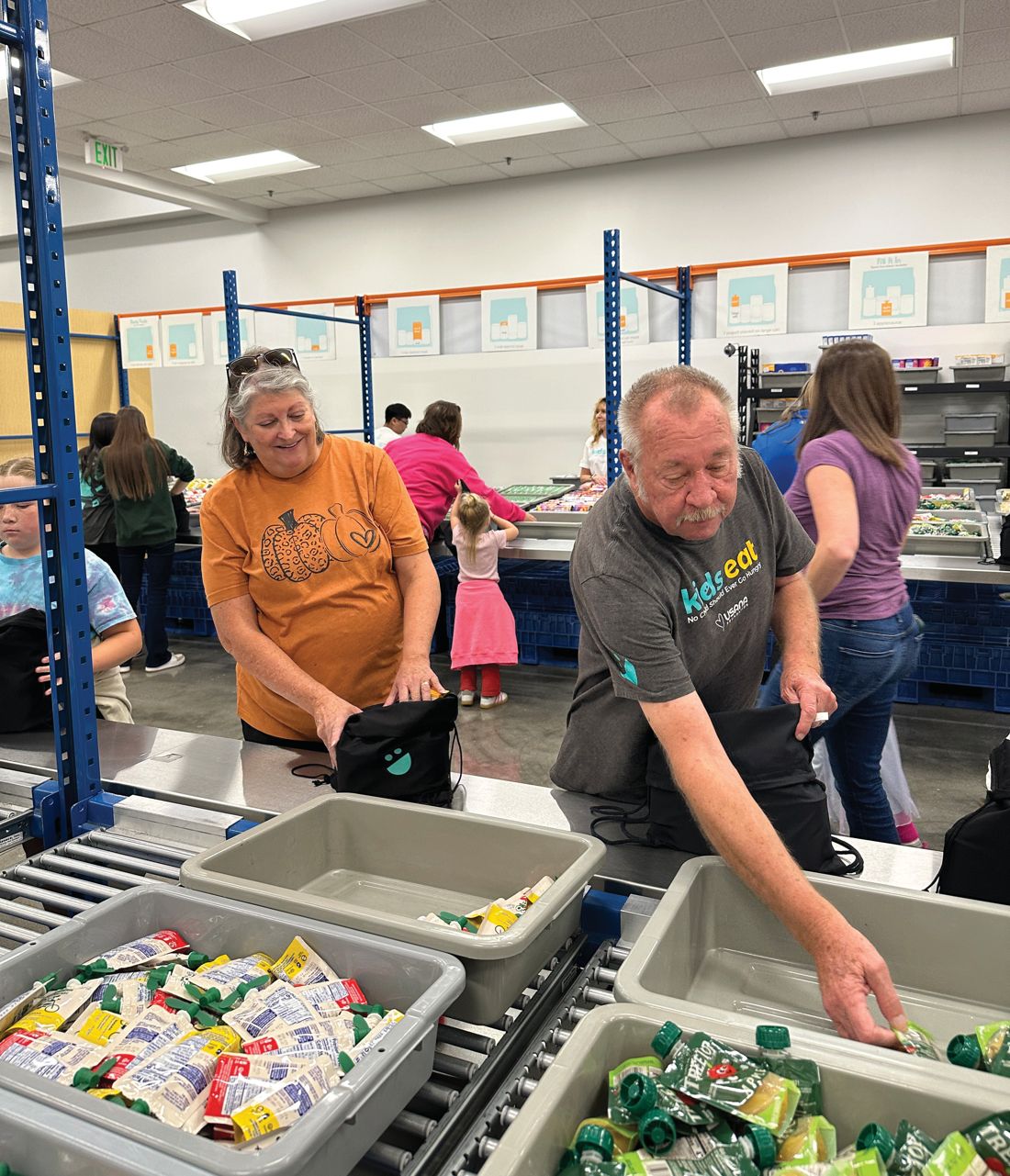 Volunteers at the packing line