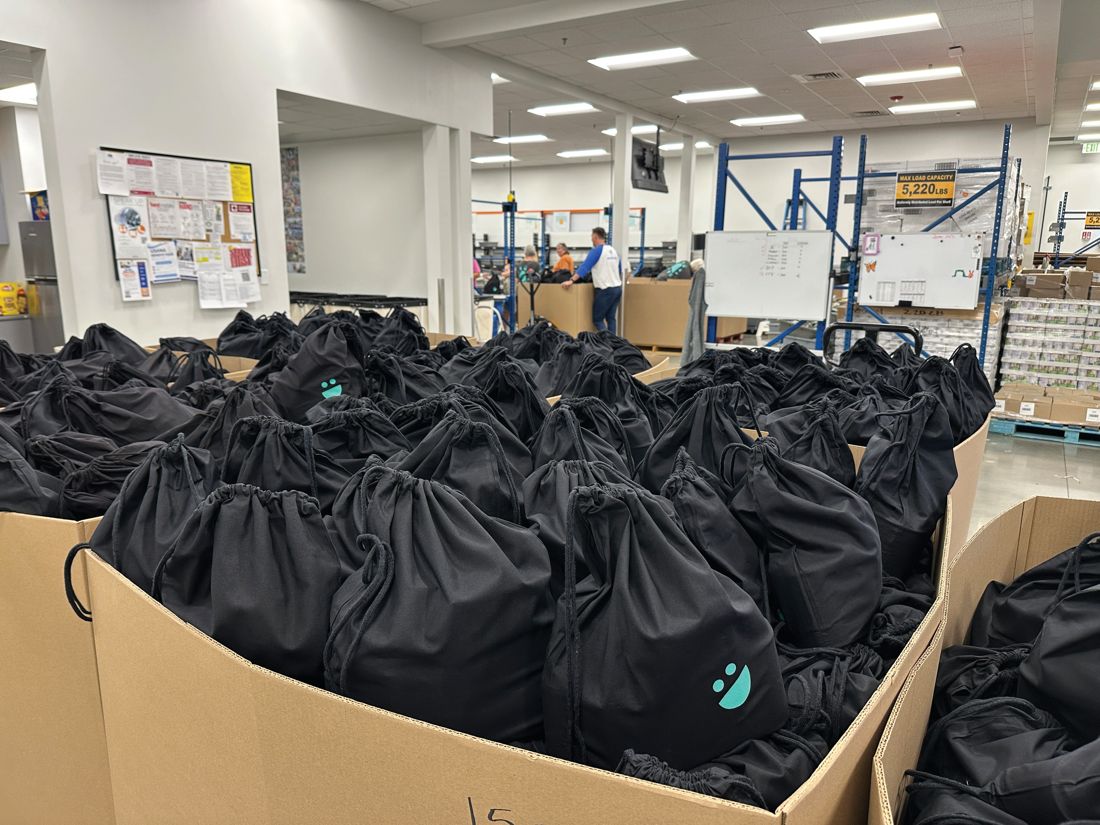 Thousands of packed emergency food bags in the USANA warehouse